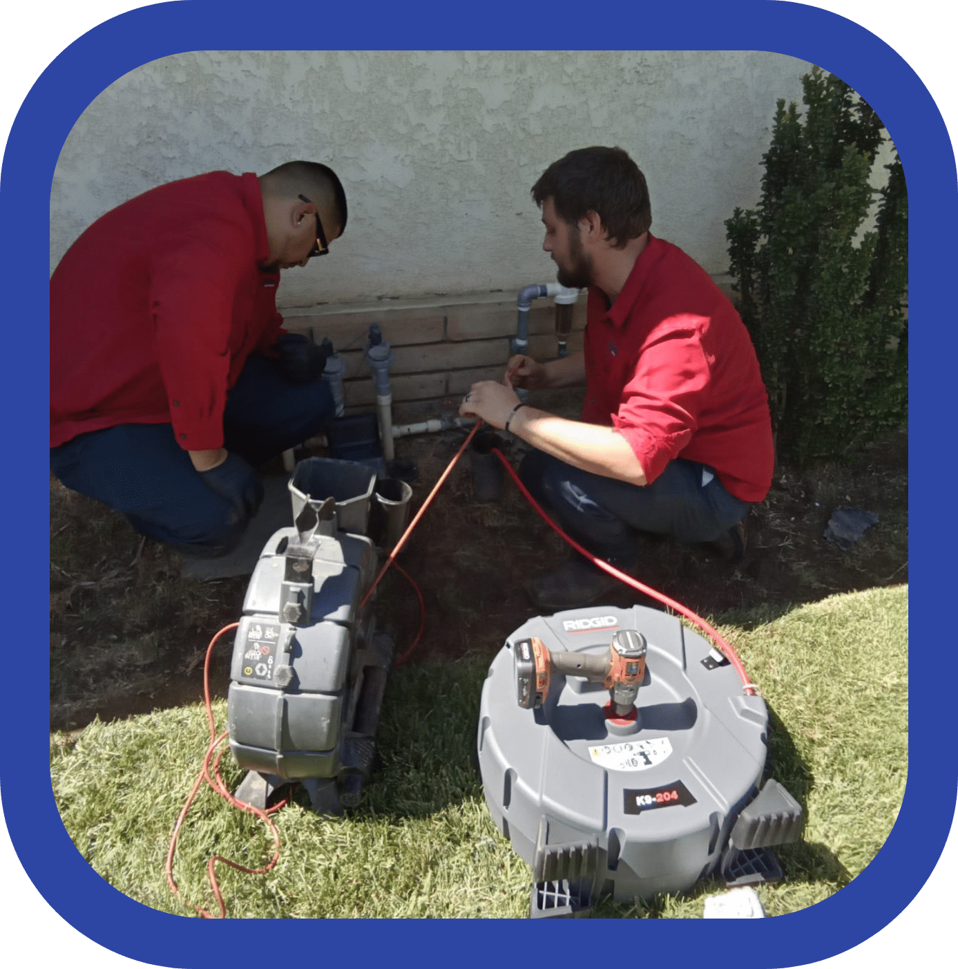 Allbritten employees servicing sewer at a home