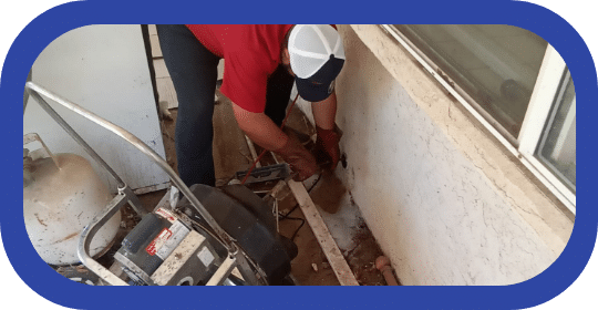Allbritten employee servicing sewer at a home